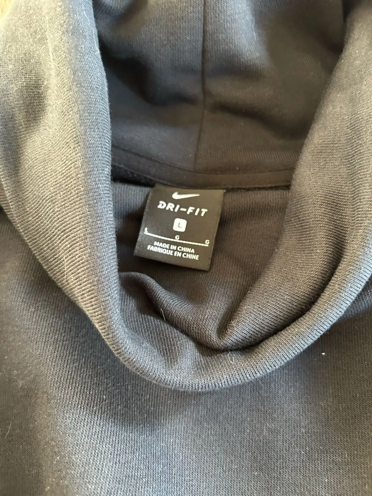 Nike Black High-Neck Sleeveless Top with Tie Detail