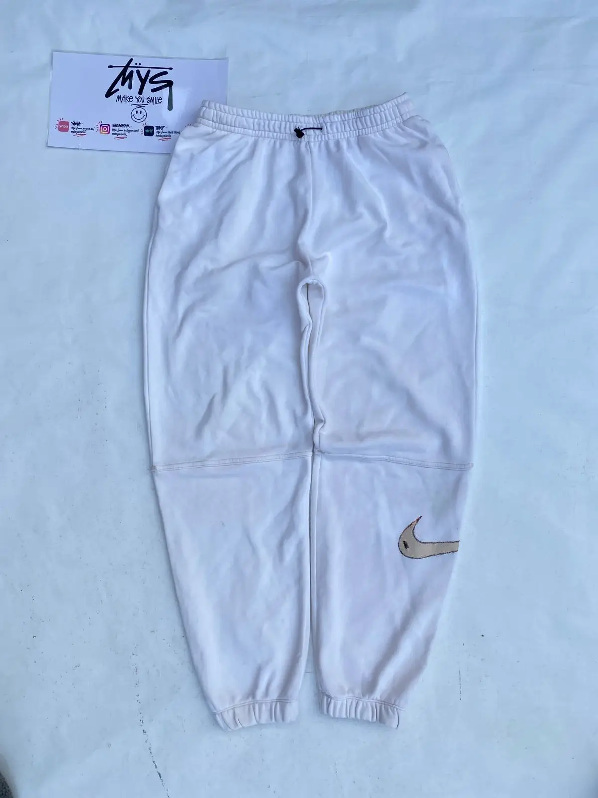 Nike White Joggers with Swoosh Detail