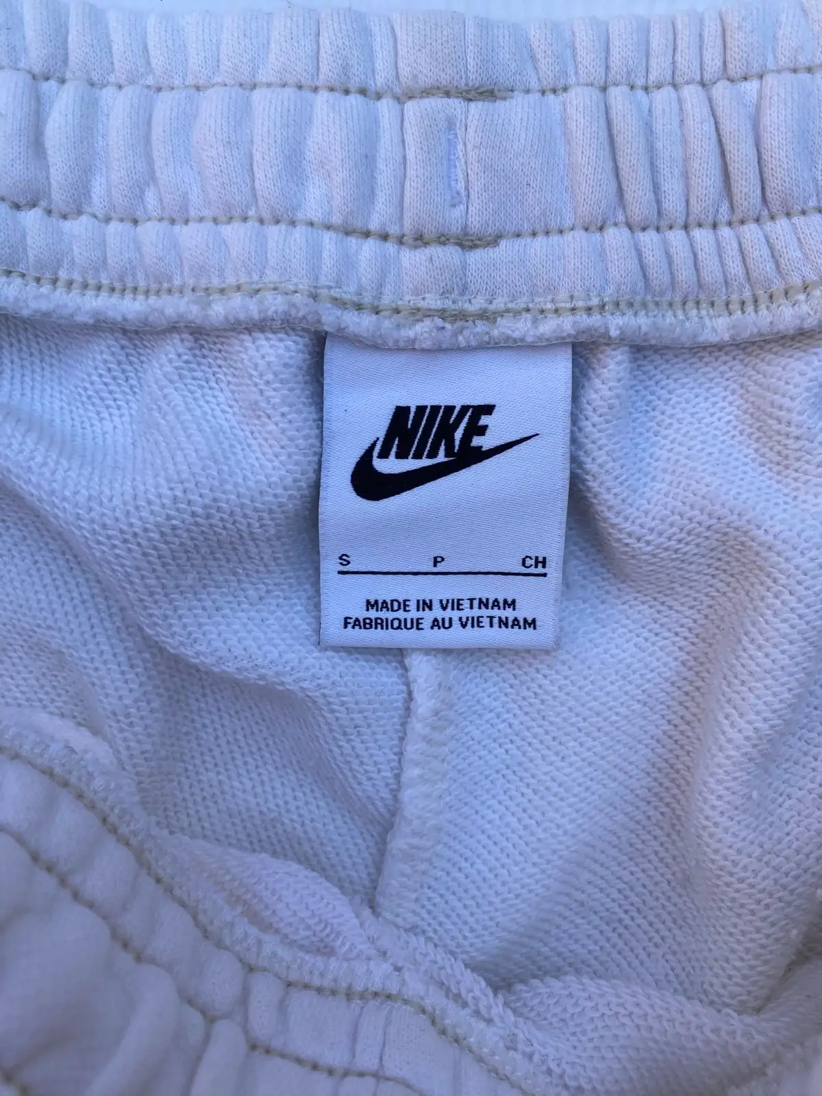 Nike White Joggers with Swoosh Detail
