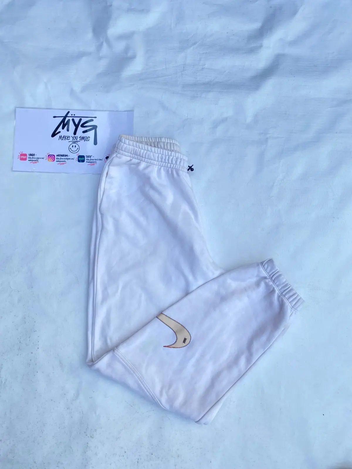 Nike White Joggers with Swoosh Detail