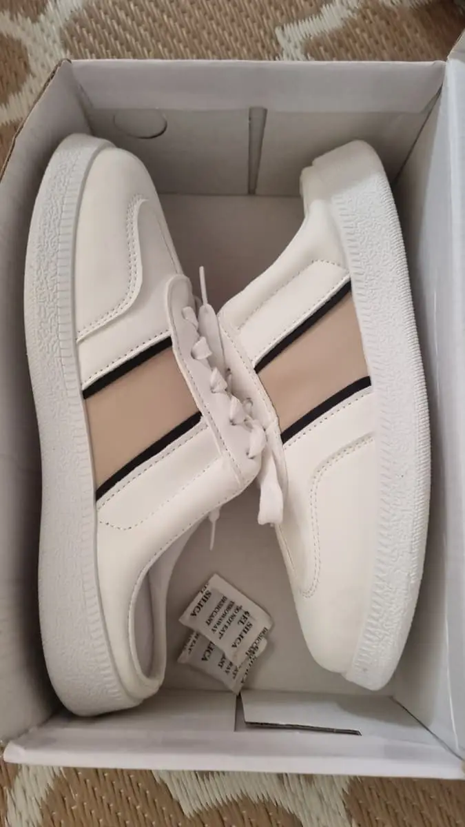 SFT ladies mule-style slip-on sneakers in crisp white with beige and black accent stripes