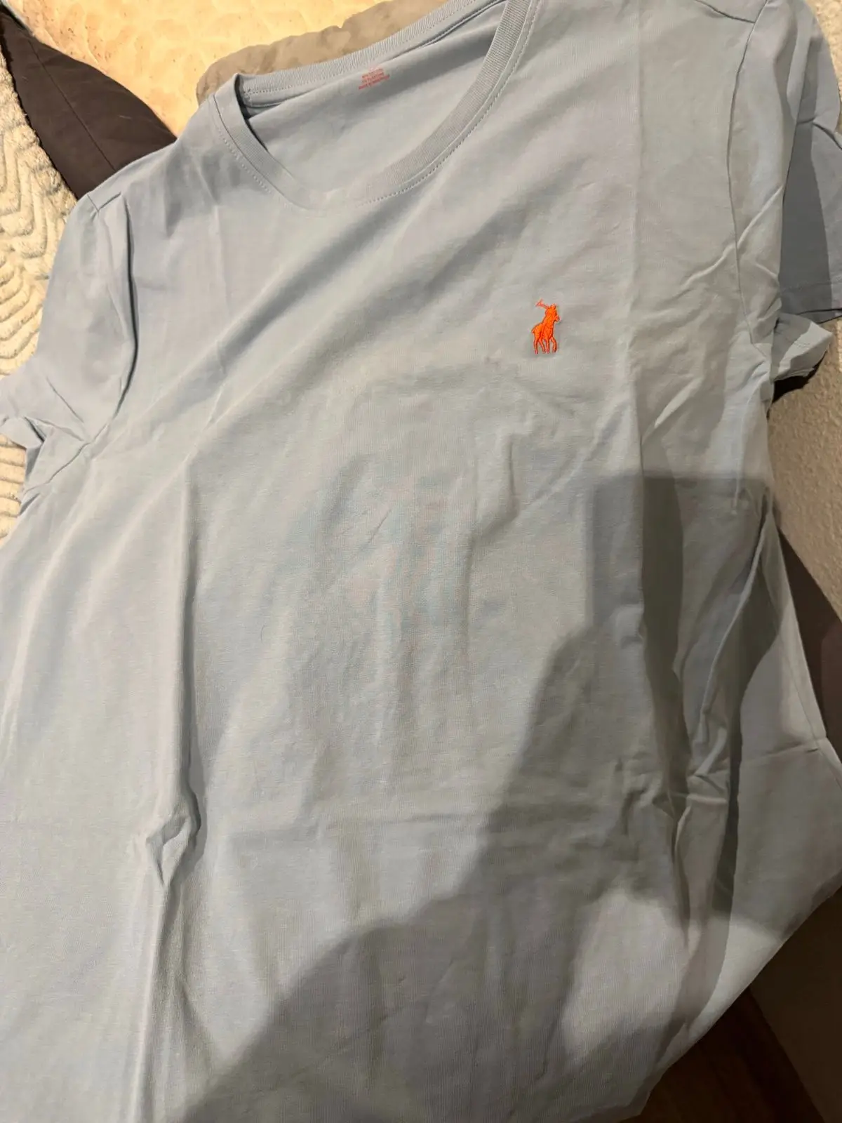 Polo Light Blue T-Shirt with Orange Logo