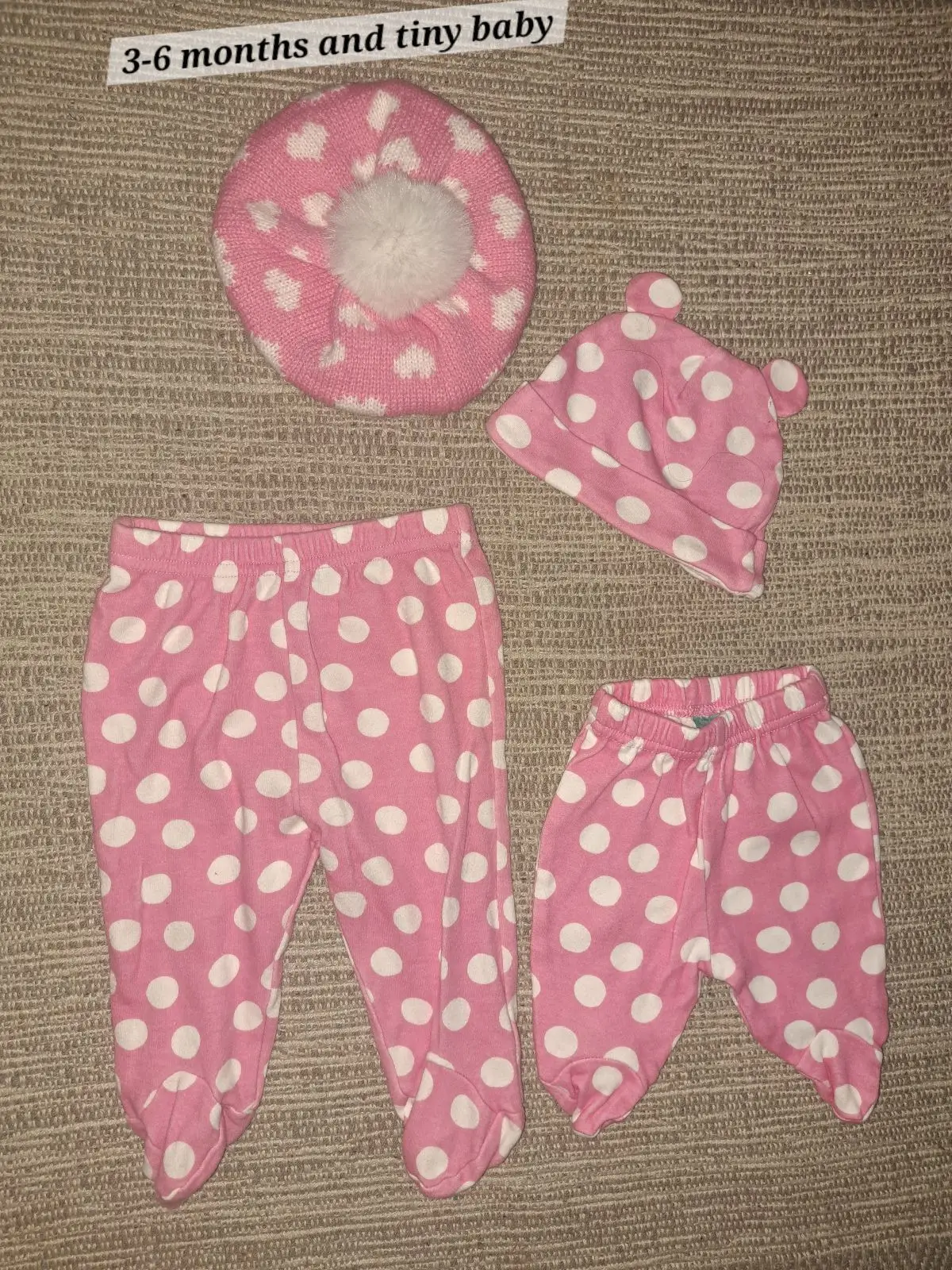 Pink and white baby clothing and hat bundle